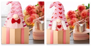 Close-up of Valentine gnome couple dolls with heart knit hats in a gift box packaging