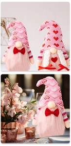 Detail of Valentine's day plush gnomes with knitted hats and heart-shaped patterns