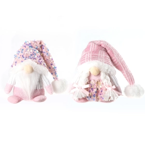 Pink Christmas gnomes set with sequins knitted hats for festive window decorations