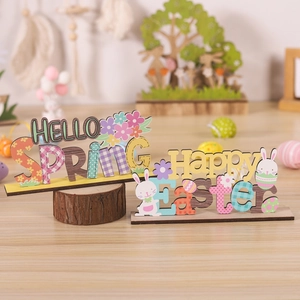 Easter wooden desk decor featuring colorful Hello Spring and Happy Easter bunny signs