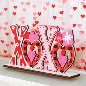 XOXO Valentine wooden table centerpiece with red buffalo plaid hearts on white base