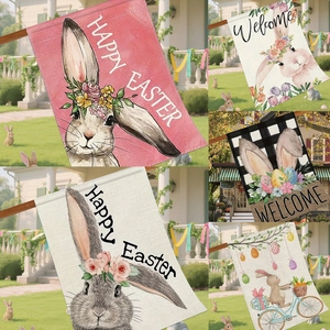 Close-up of Easter garden flag with cute rabbit print and rustic linen texture