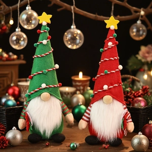 Pair of festive Christmas gnomes with pointed star hats for holiday tabletop decoration