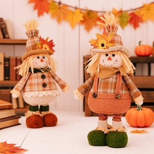 Standing scarecrow dolls with sunflowers and maple leaves for Thanksgiving harvest decor