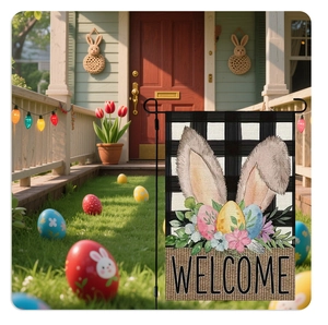 Close-up of Easter garden flag with bunny ears and colorful eggs on burlap background