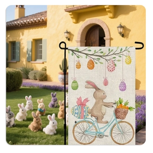 Easter garden flag detail showing a cute rabbit riding a bike on premium linen fabric
