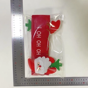 Christmas fridge handle cover featuring Santa Claus and HO HO HO text decoration