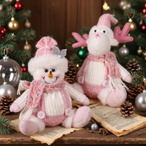 Pink Christmas plush ornaments set featuring a snowman and reindeer in knit sweaters