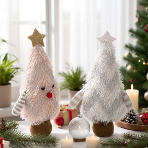Detail of plush Christmas tree dolls with festive ornaments and cozy holiday home decor