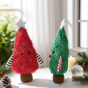 Close-up of red and green plush Christmas tree dolls with festive ornaments and pine cones