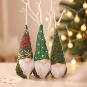 Set of three green Christmas gnomes hanging ornaments with knit hats and white beards