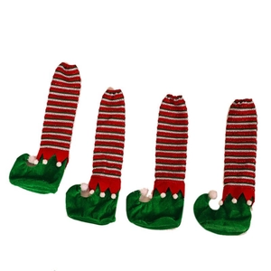Lot de quatre couvre-pieds de chaise lutin de Noël rayés avec bottes vertes recourbées