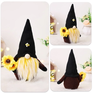 Macro view of sunflower gnome doll with plush fabric texture and bee decorations