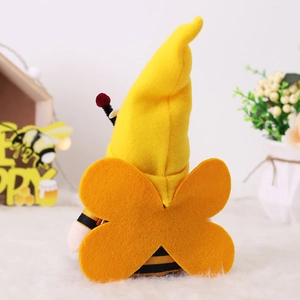 Rear view of cute striped bee gnome plush with felt wings for festive home decoration