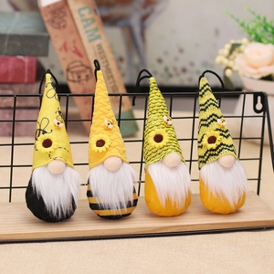 Set of four handmade bee festival gnome plush pendants with sunflowers and honeybee motifs