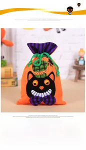 Close-up of orange velvet Halloween drawstring bag with cute embroidered black cat detail