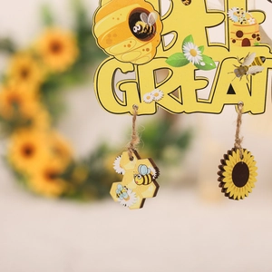 Rustic wood sign featuring sunflowers and bees with the positive quote Bee Great