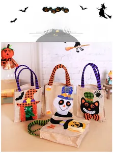 Detail of four burlap Halloween candy bags featuring witch, skull, and black cat designs
