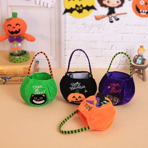 Set of four plush Halloween candy bags with embroidered festive characters and striped handles