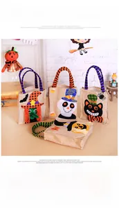Detail of four linen Halloween candy bags with felt witch, skull, cat and pumpkin designs