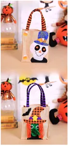 Detail of Halloween burlap candy bags with cartoon plush embroidery and striped handles