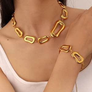 Set minimalista con collana e bracciale a catena spessa in acciaio inox dorato