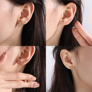 Coffret de boucles d'oreilles dorées feuilles et cœurs avec zircons brillants
