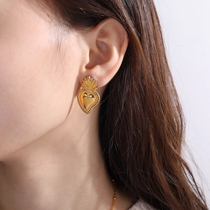 Vintage golden sacred heart earrings with crown flame detail and beaded edge design