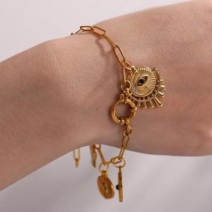 Collana in acciaio inossidabile placcato oro 18K con occhio del male e ciondoli a sole
