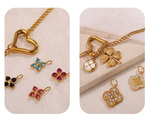 Close-up of 18K gold plated stainless steel necklaces with colorful gemstone pendants
