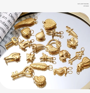 Detailed view of polished golden marine charms like starfish and shells on a mirror tray