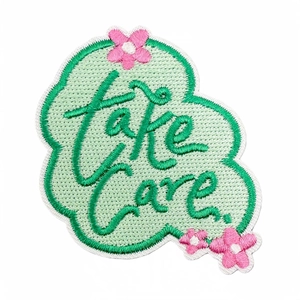 Mint green cloud patch with Take Care embroidery and pink flowers for bags and clothing