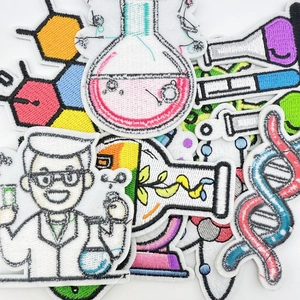 Macro view of colorful science experiment embroidered patches for clothing decoration