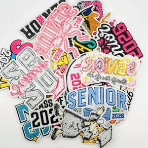 Detailed close-up of colorful 2026 senior graduation embroidered patches with fine textures