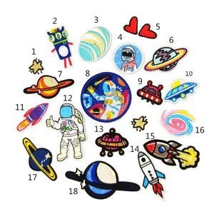 Detailed collection of 18 space-themed embroidered patches featuring astronauts and rockets