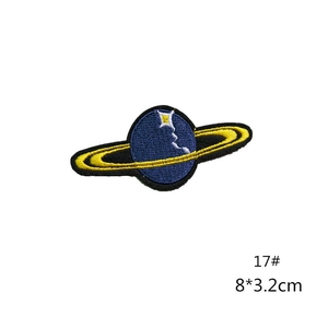 Close-up of Saturn planet embroidery patch in deep blue and yellow, size 8x3.2cm