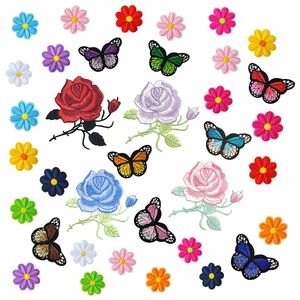 Colorful floral and butterfly embroidered patches set with roses and daisies for DIY crafts