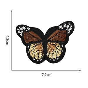 Detail view of butterfly embroidery patch showing 7.0cm width and 4.8cm height dimensions