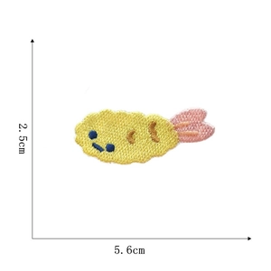 Detail view of cartoon shrimp tempura embroidery patch showing 5.6cm by 2.5cm dimensions