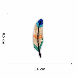 Detailed view of colorful feather embroidery patch with exact dimensions of 8.5x2.6 cm