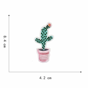 Detailed embroidery patch of a green cactus in a pink pot with 8.4cm height dimensions