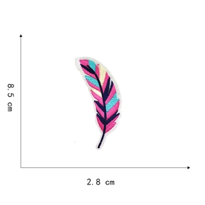 Macro shot of colorful feather embroidery patch with 8.5cm by 2.8cm size measurements