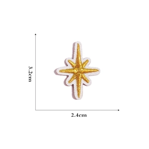 Golden embroidered star patch with 8-point ray design measuring 3.2cm x 2.4cm