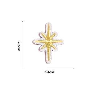 Detail view of yellow star embroidery patch showing fabric texture and 3.2cm height scale