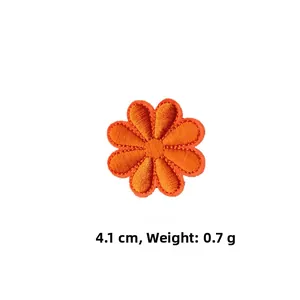Detailed orange sunflower embroidery patch measuring 4.1cm and weighing 0.7g on white backdrop