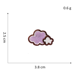 Close-up of purple cloud embroidery patch with white stars and dimensions labeled