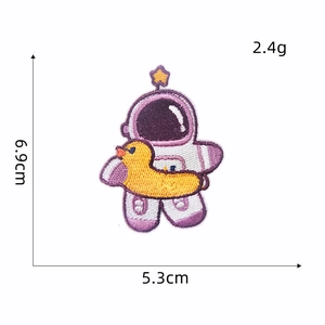Embroidered astronaut patch with rubber duck and star, measures 6.9cm by 5.3cm