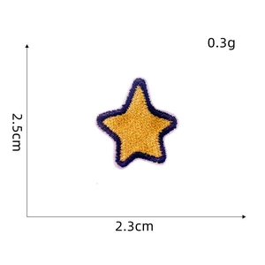 Close-up of gold star embroidered patch with blue borders and detailed fabric texture