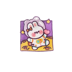 Embroidered cartoon rabbit astronaut planet patch with self-adhesive backing for clothing