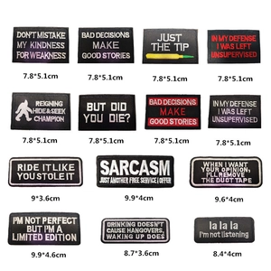 Set of 14 embroidered patches with slogans in rectangular shapes for garment decor